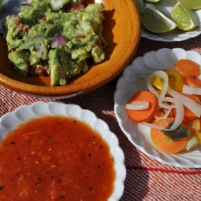 Typical healthy condiments: guacamole, salsa, rajas (pickled carrots, onion, and jalapeño peppers) and limes